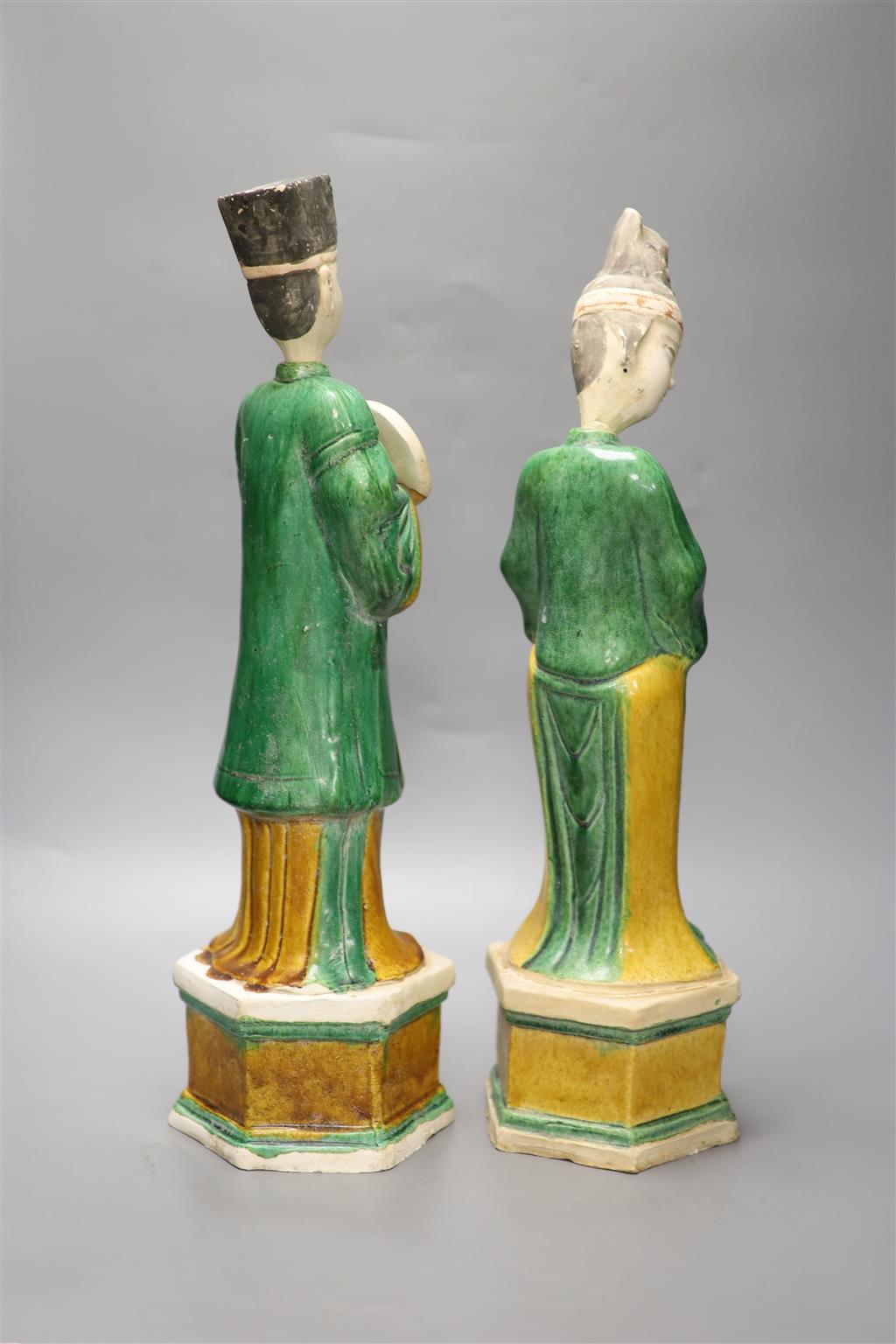 Two Chinese terracotta sancai-glazed male and female tomb figures, each with detachable head, tallest 47cm